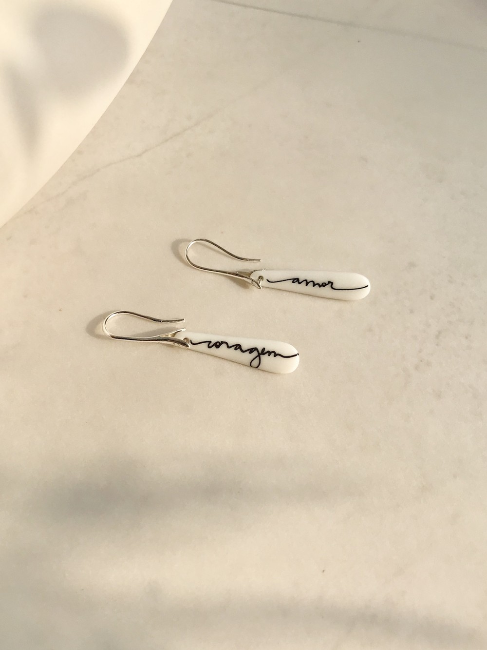 Foto do produto brinco coragem amor